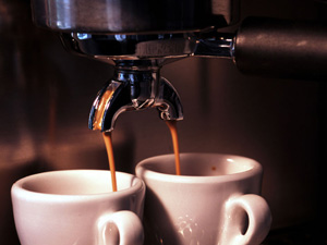 brewing espresso with an espresso maker